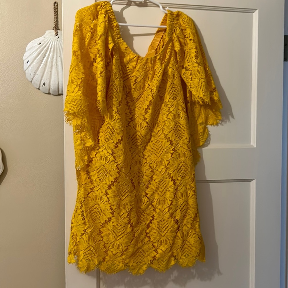 Beautiful yellow Trina Turke dress.  Brand new.  Scalloped bottom and sleeves.